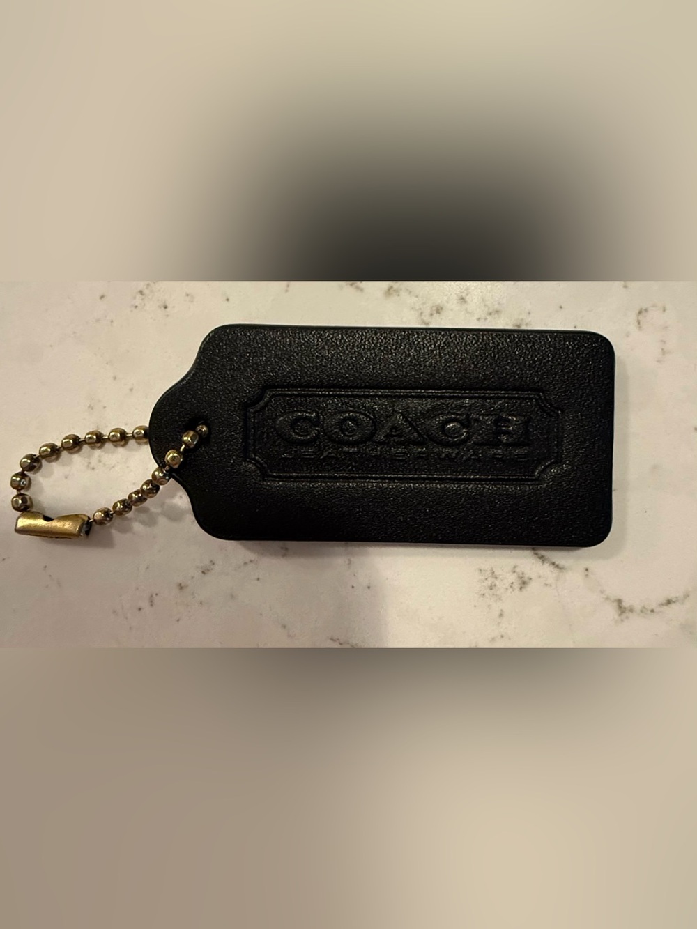 Coach leather tag